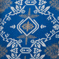 Blue with white and gold pattern swatch