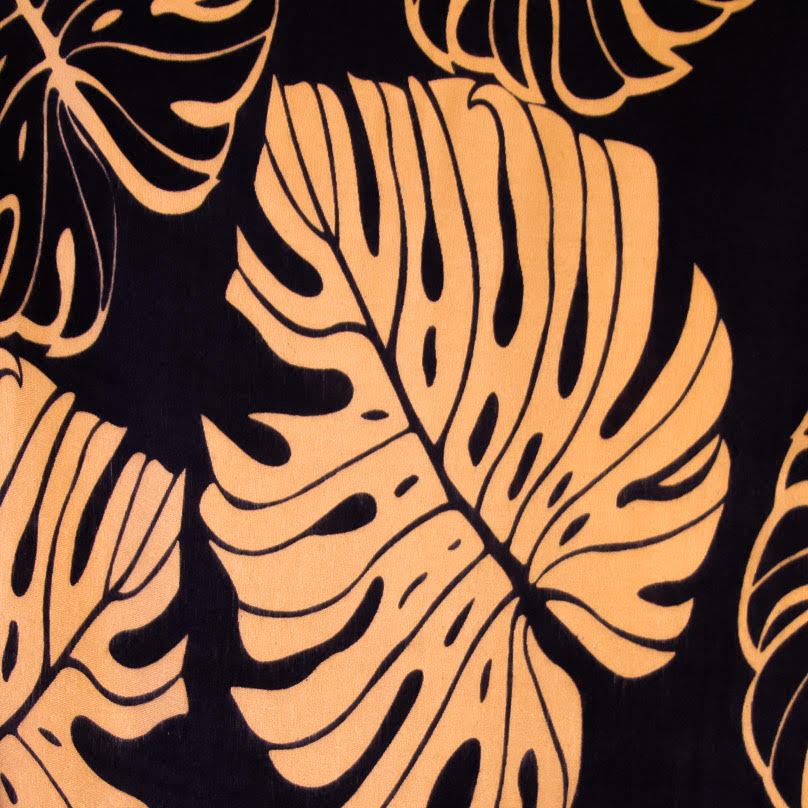 black and gold palm leaf pattern swatch