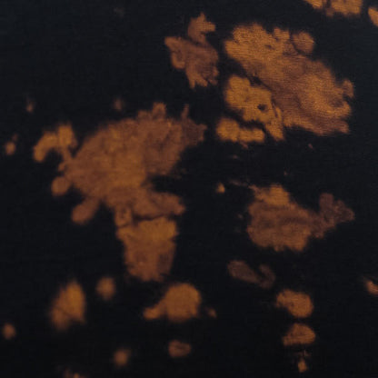 black with gold tie dye pattern swatch
