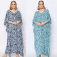Two women stand side by side, each wearing a patterned caftan. The woman on the left wears a dark blue and white design, while the woman on the right sports a light blue version. Both have similar hairstyles and poses against a plain background.